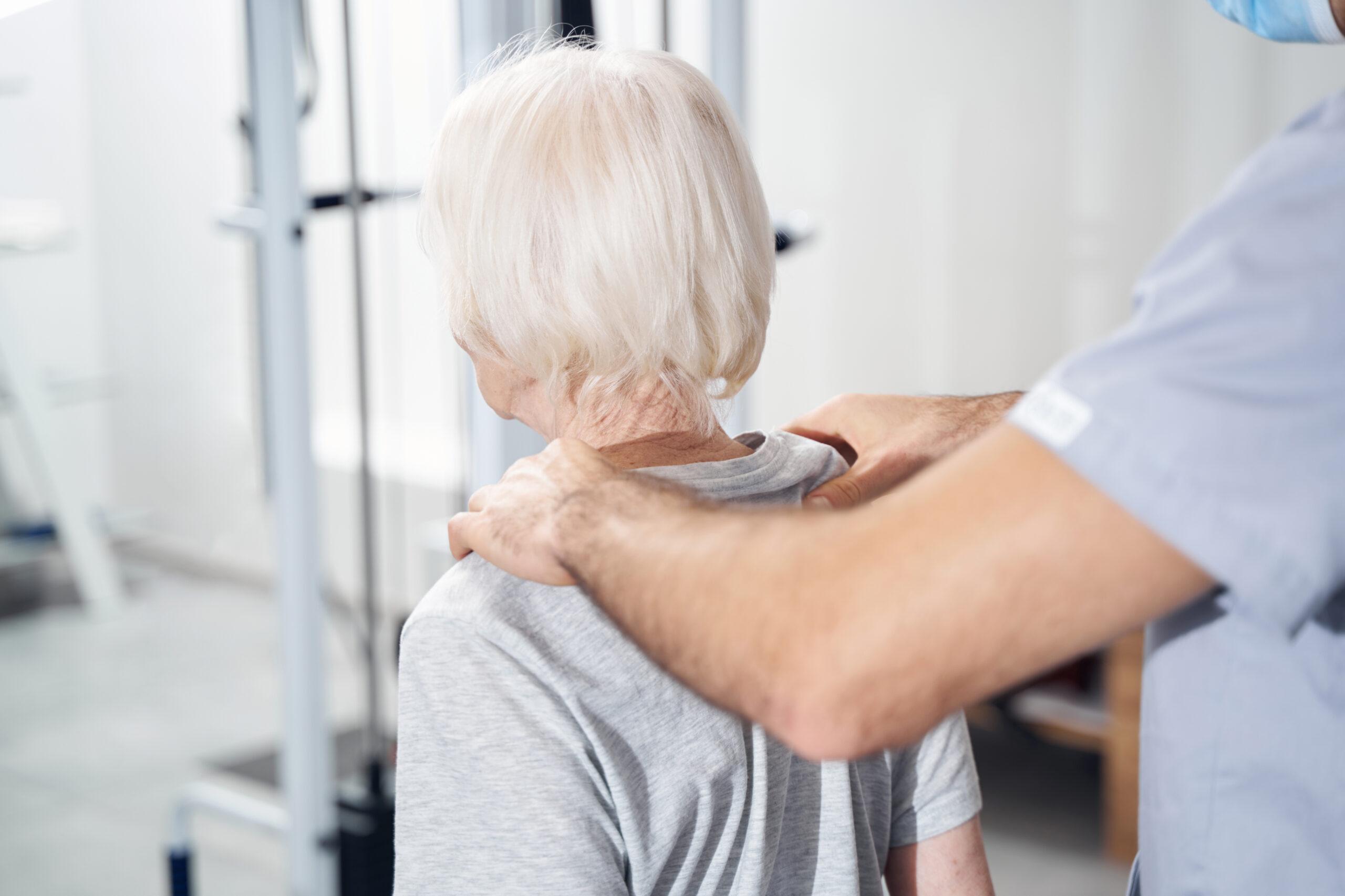 medical specialist giving shoulder massage to seni 2026 01 09 06 20 50 utc scaled